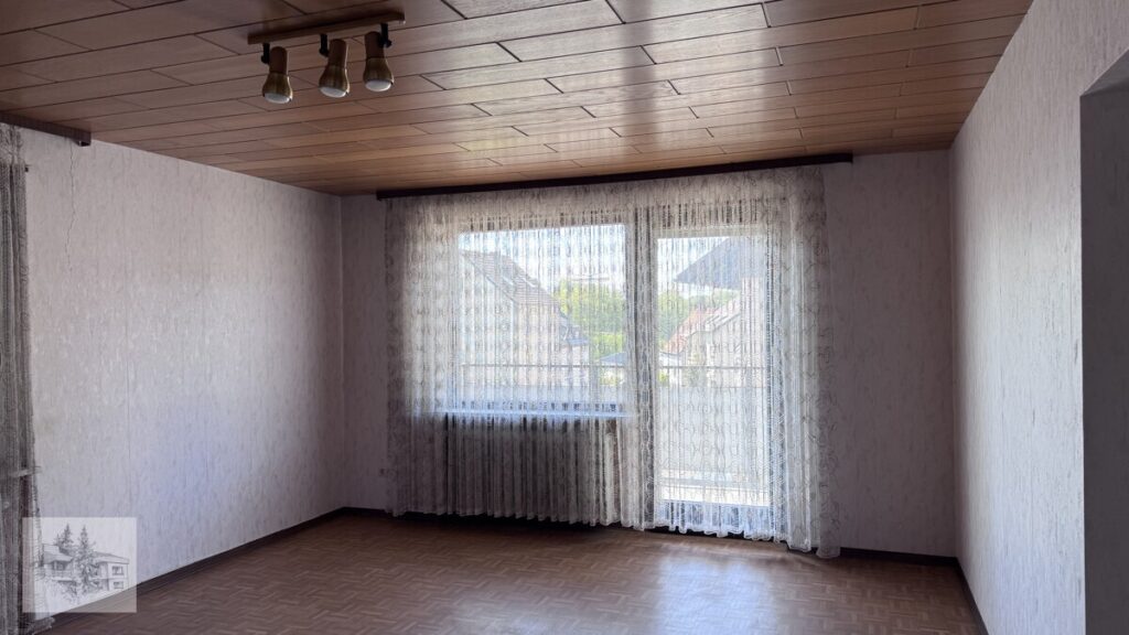 OG Wohnzimmer mit Balkonzugang